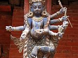 Kathmandu Patan Durbar Square Mul Chowk 23 Carved Wooden Roof Strut Of Many Armed Blue Wrathful Figure Standing On A Pig